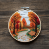 close-up-cross-stitched-picture-bench-park
