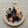 close-up-embroidery-bat-flowers-crescent