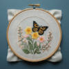 embroidery-butterfly-flowers-white-cloth