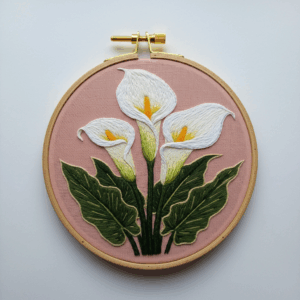 embroidery-white-flower-green-leaves-pink-background