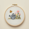 embroidery-watering-can-butterfly-flowers