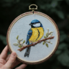 arafed-bird-branch-flower-hoop