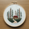 close-up-cross-stitch-picture-house-woods