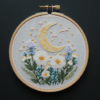 embroidery-crescent-flowers-black-surface
