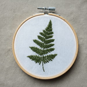 close-up-embroideryed-fern-leaf-hoop