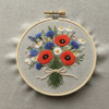 embroidery-bouquet-flowers-ribbon-table