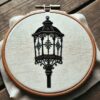 close-up-cross-stitched-picture-lamp-post