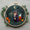 close-up-cross-stitch-picture-fox-witch-costume