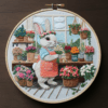 close-up-cross-stitch-picture-rabbit-flower-shop