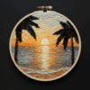 close-up-cross-stitch-picture-sunset-palm-trees