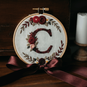 close-up-cross-stitched-monogram-ribbon