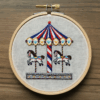 close-up-cross-stitched-picture-carousel-2