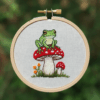 close-up-cross-stitched-picture-frog-mushroom