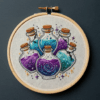 close-up-cross-stitched-picture-group-bottles