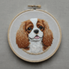 close-up-dog-embroideryed-hoop-white-background