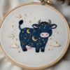close-up-embroidery-cow-crescent-stars