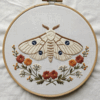 close-up-embroidery-moth-flowers