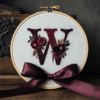 close-up-embroideryed-letter-w-ribbon
