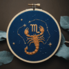 close-up-embroideryed-zodiac-sign-scorpion