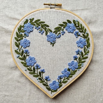 heart-shaped-embroidery-blue-flowers-white-cloth