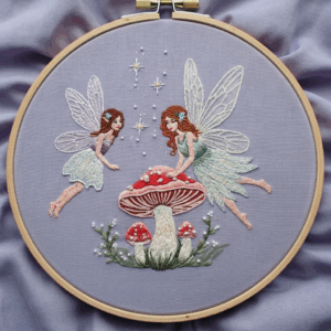 araffe-fairy-fairy-girl-embroideryed-purple-fabric
