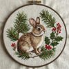 embroidery-rabbit-sitting-branch-holly-leaves