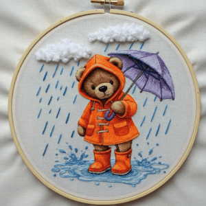 embroidery-teddy-bear-raincoat-holding-umbrella