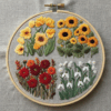 embroidery-variety-flowers-linen-surface