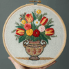 embroidery-vase-flowers-being-held-by-person-2