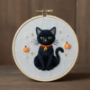 close-up-black-cat-collar-pumpkin