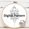 close-up-cross-stitched-picture-lamp-post