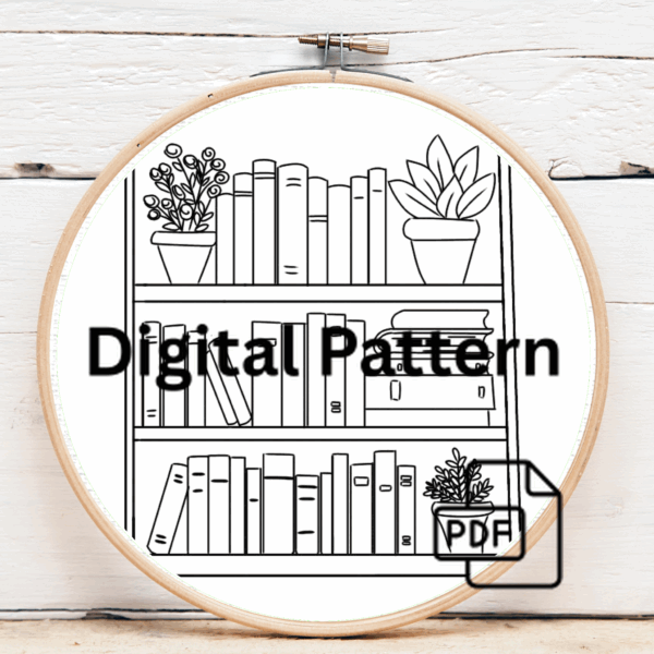 close-up-cross-stitched-picture-shelf-books-plants