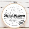 close-up-cross-stitched-picture-small-house