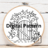 close-up-cross-stitched-picture-wooden-door