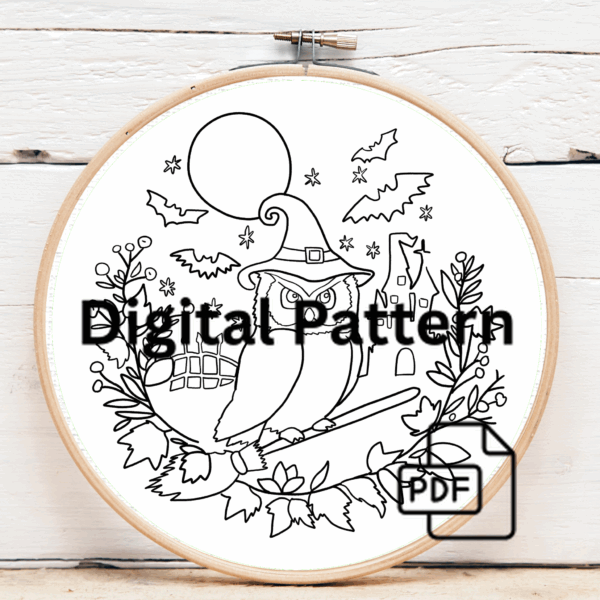close-up-cross-stitched-picture-owl-broom