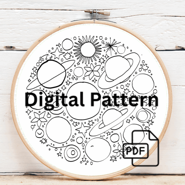 close-up-cross-stitched-picture-planets-stars