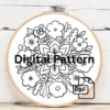 close-up-cross-stitched-picture-purple-flowers