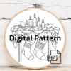 close-up-cross-stitched-picture-stockings-candles