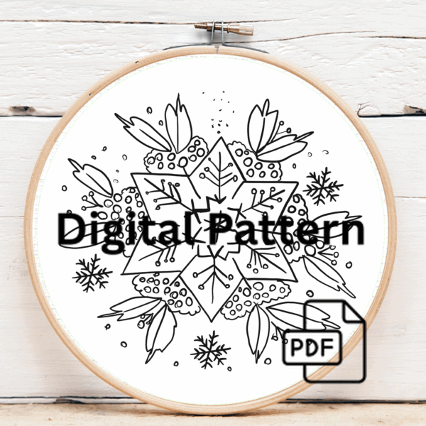 close-up-cross-stitched-snowflake-ornament-pine-tree