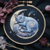 close-up-cat-laying-moon-flower