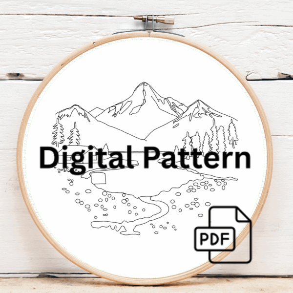 close-up-embroidery-mountain-scene-pond