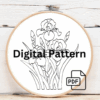 close-up-embroidery-purple-irises-wooden-surface
