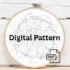 close-up-embroidery-sunflowers-blue-surface