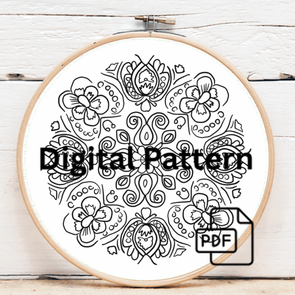 close-up-embroidery-black-surface-flowers