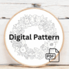 close-up-embroidery-wreath-flowers-white-surface