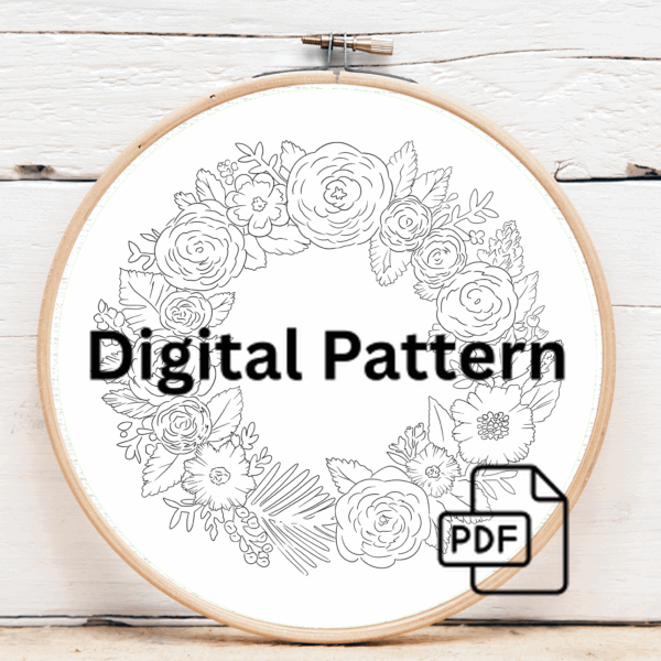 close-up-embroidery-wreath-flowers-white-surface