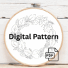 close-up-embroidery-wreath-leaves-berries