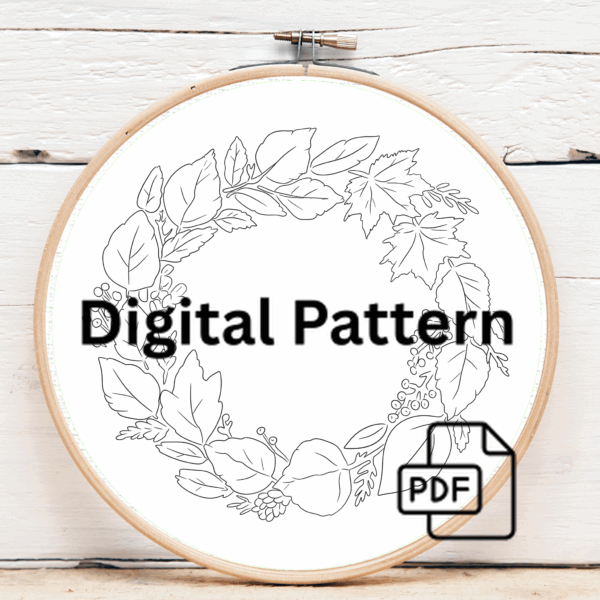 close-up-embroidery-wreath-leaves-berries