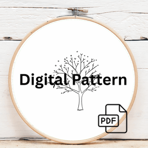 close-up-embroideryed-picture-bird-tree