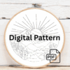 close-up-embroideryed-picture-mountain-sun